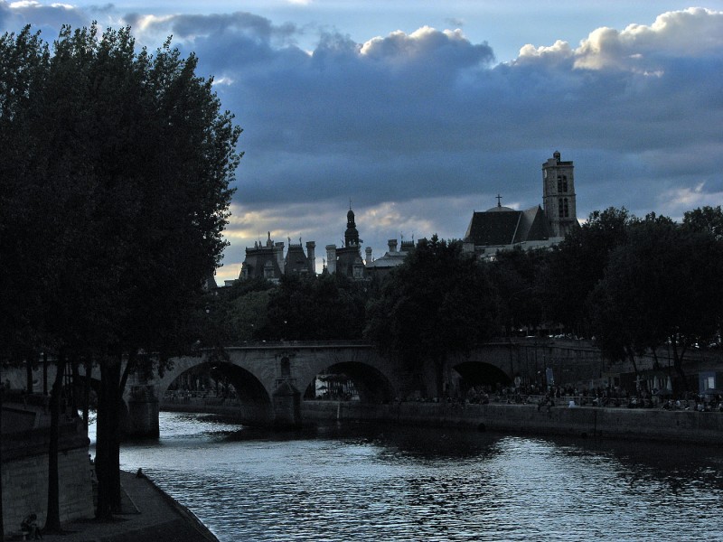 clouds over the river seine in paris