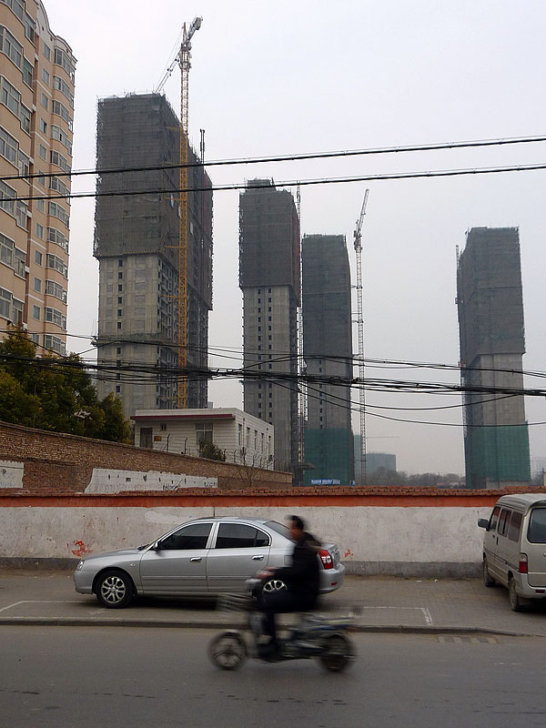 zhengzhou's high rise apartments in the slums