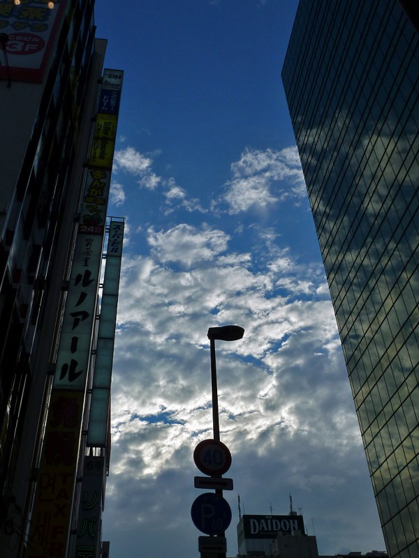 akihabara blue sky storm clouds tokyo japan