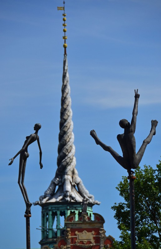 copenhagen stock exchange dragons spire balance act art statue exhibit copenhagen stock exchange dragons spire balance act art statue exhibit
