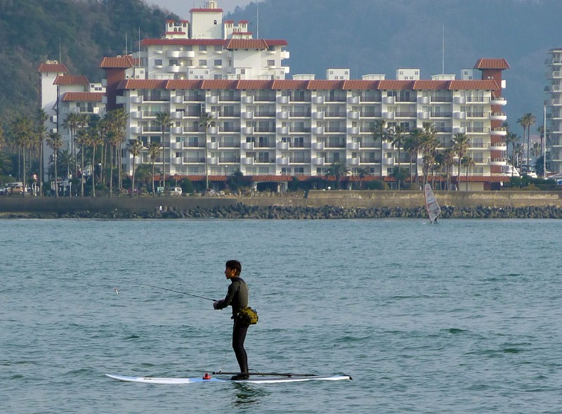 kamakura wind surfing fishing fishing on a surf board kamakura japan