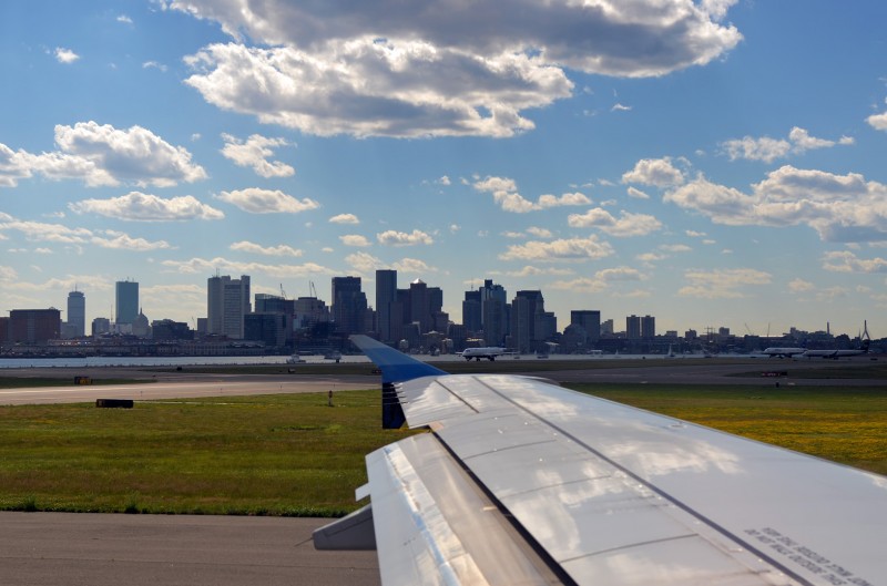 boston from airplane boston logan airport view from plane window boston skyline