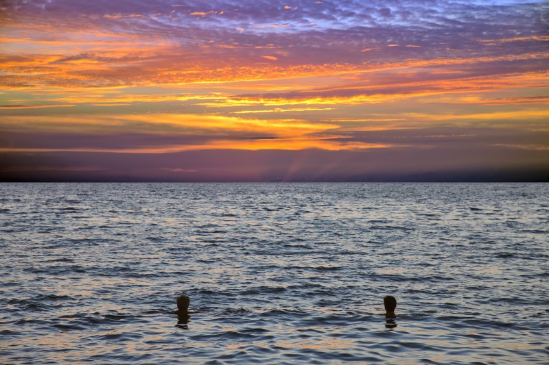 anaehoomalu beach watching sunset from pacific ocean