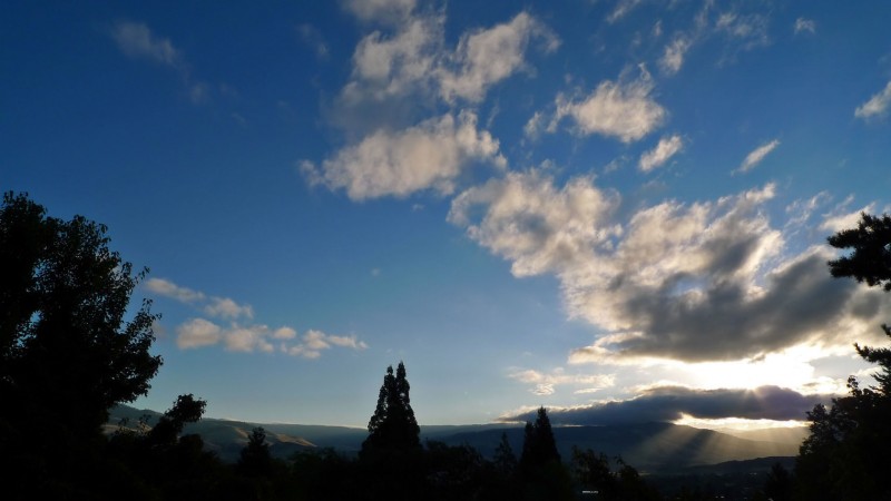 clouds and sun breaking through
