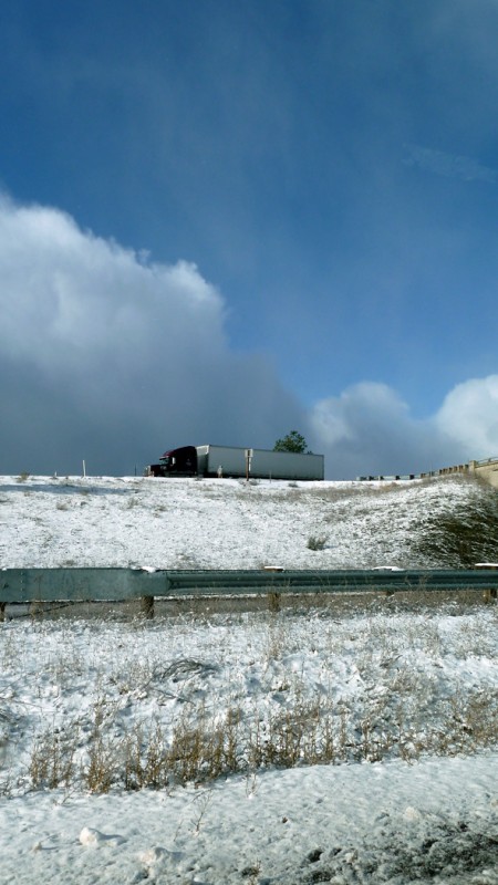 truck in snow oregon california border blue sky clouds