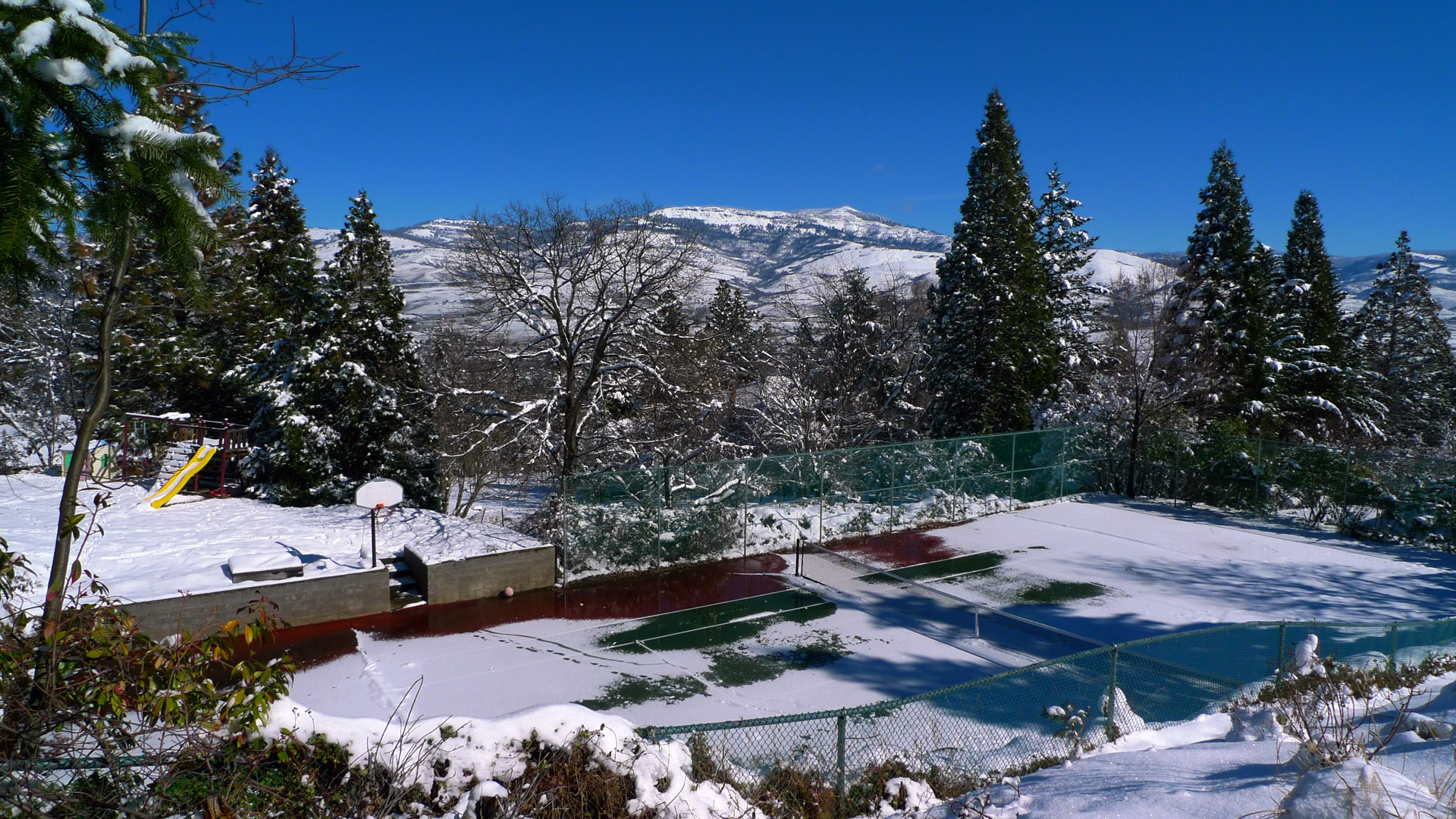 snow covered tennis court ashland oregon grizzly peak mountains