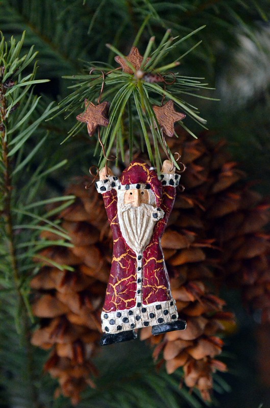 santa ornament on pine cone tree christmas