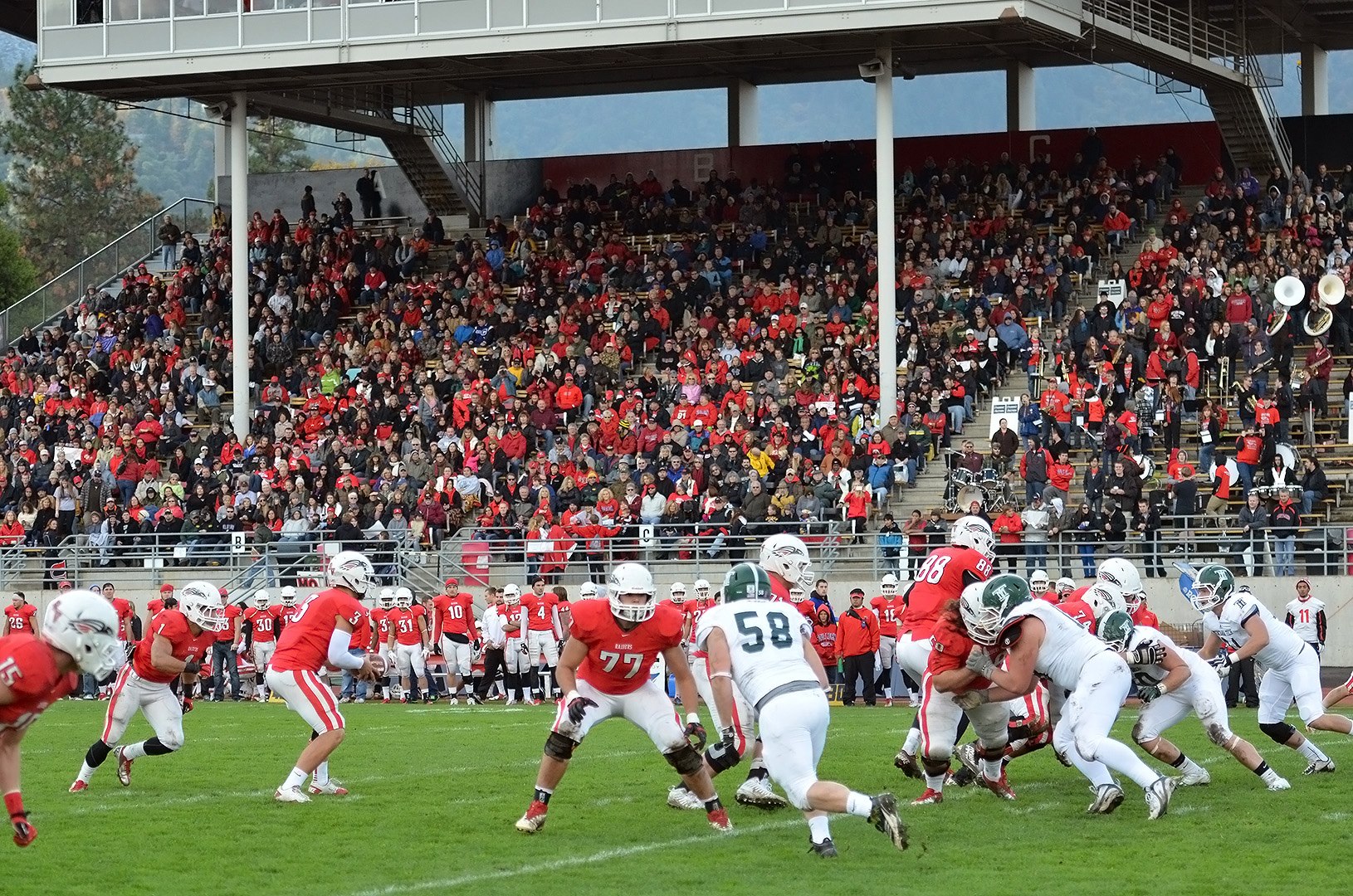 Football is a team game. Southern Oregon University.