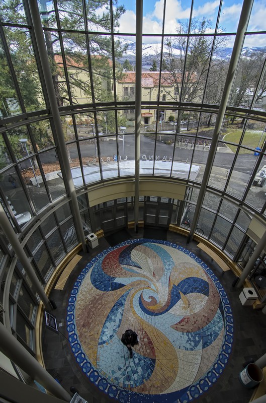 Robert Stout and Stephanie Jurs created the spectacular 28-foot ceramic mosaic that adorns the floor of the entrance rotunda hannon library sou